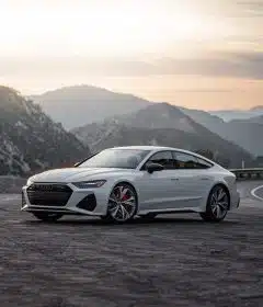 white mercedes benz coupe on road during daytime