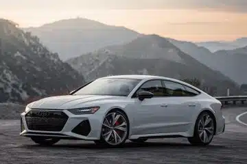 white mercedes benz coupe on road during daytime